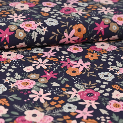Popeline marine mit bunten Blumen
