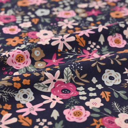 Popeline marine mit bunten Blumen