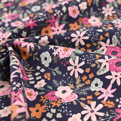 Popeline marine mit bunten Blumen