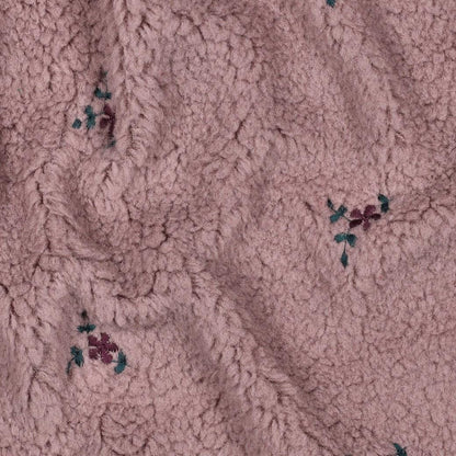 Teddy Stoff mit gestickten Blumen
