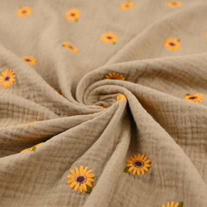 Musselin mit gestickten Sonnenblumen
