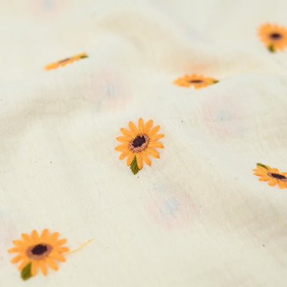 Musselin mit gestickten Sonnenblumen