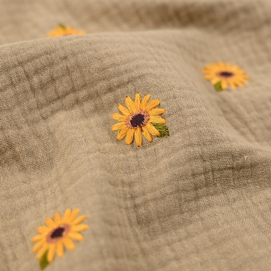 Musselin mit gestickten Sonnenblumen