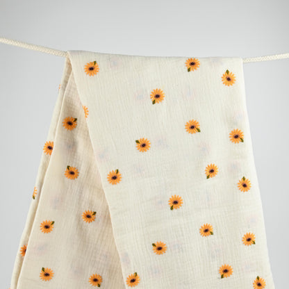 Musselin mit gestickten Sonnenblumen