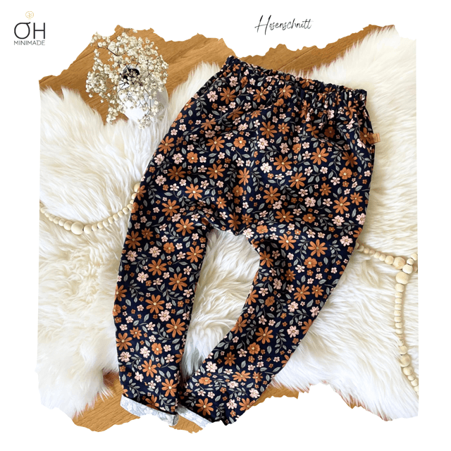 Feincord navy mit Blumen und Glitzer